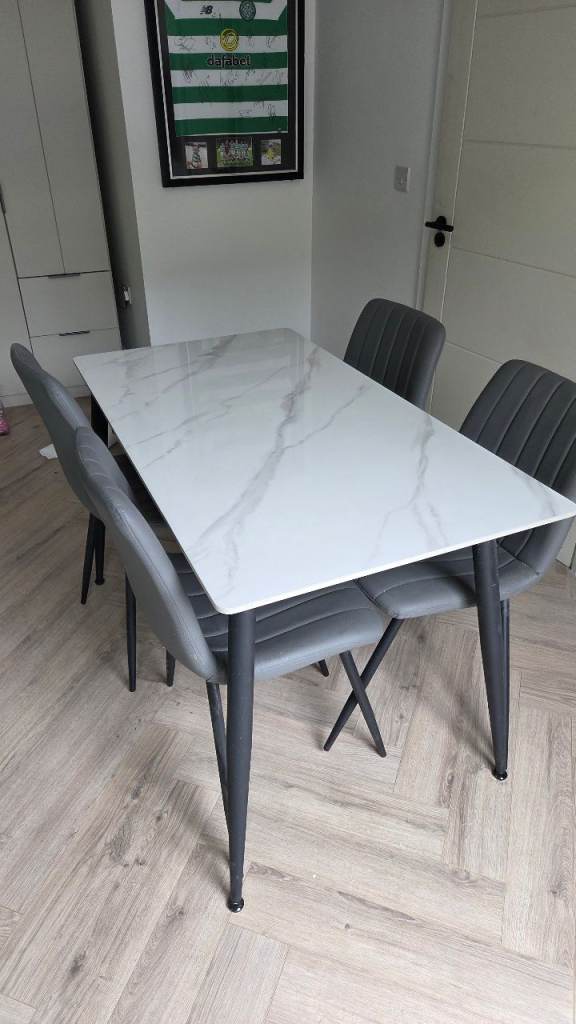 Marble dining table and four chairs
