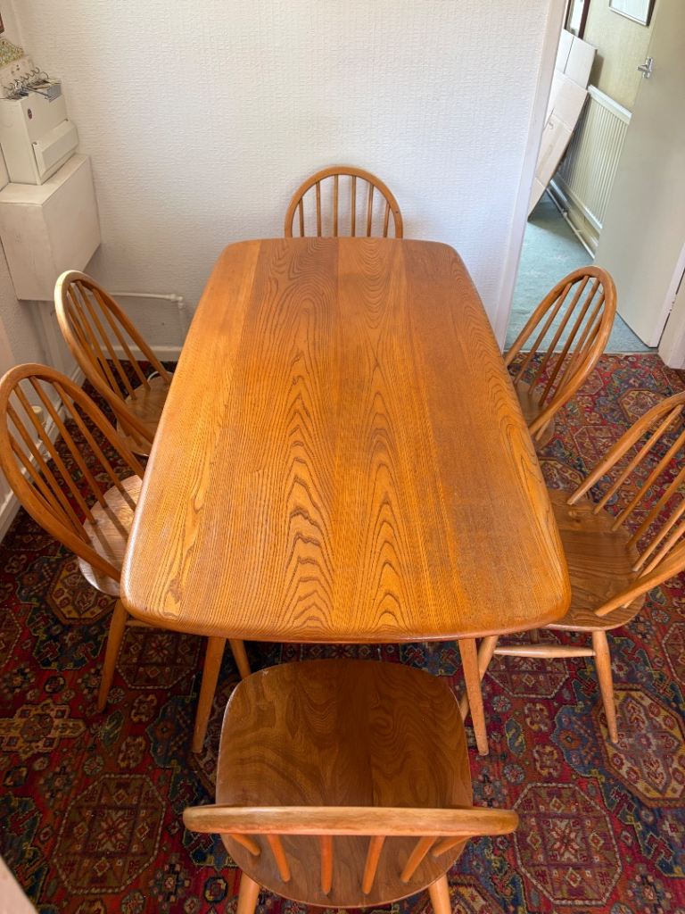 Ercol Plank Dining Table and Six Chairs – Good Condition Wood Set
