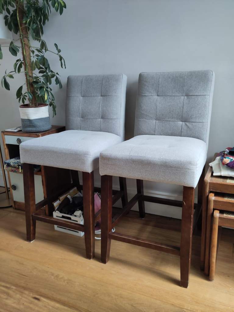 Pair of grey fabric bar stools