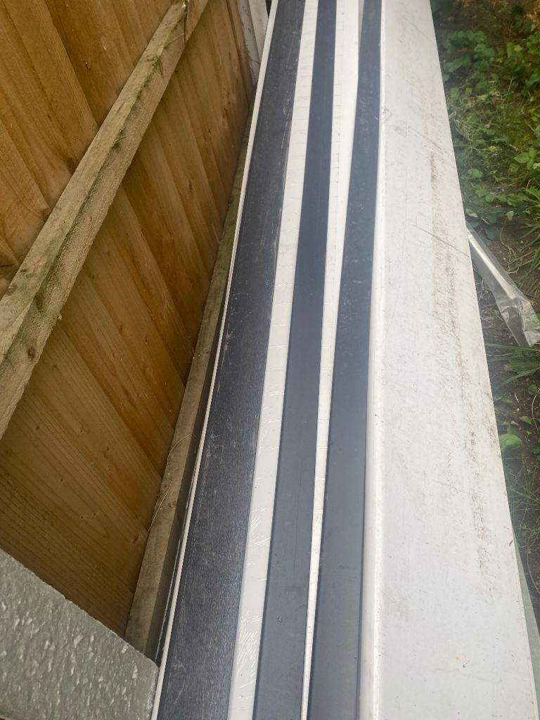 Grey plastic trim for above doors and windows