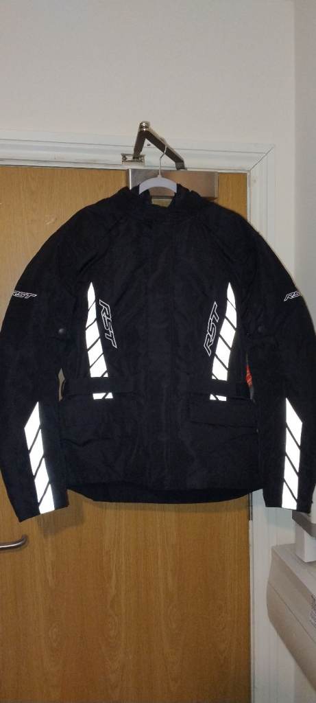 Brand new Mens large RST motorcycle jacket and medium size shark helmet