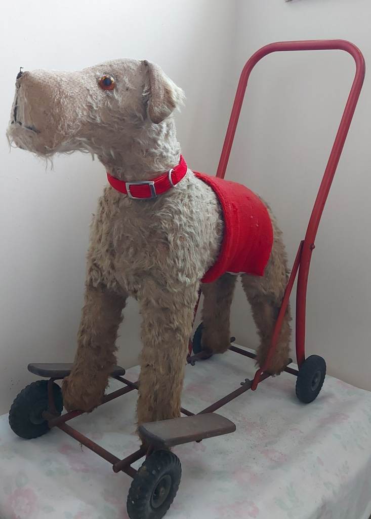 Vintage Stuffed push along dog 