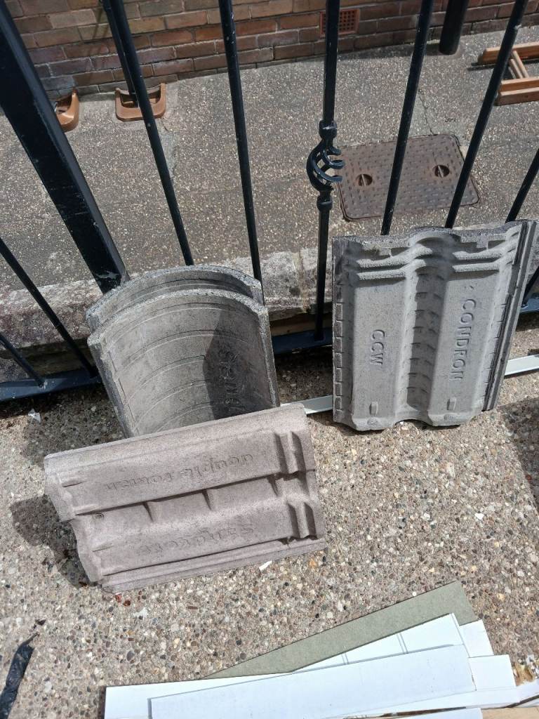 2 new ridge tiles and 2 tiles