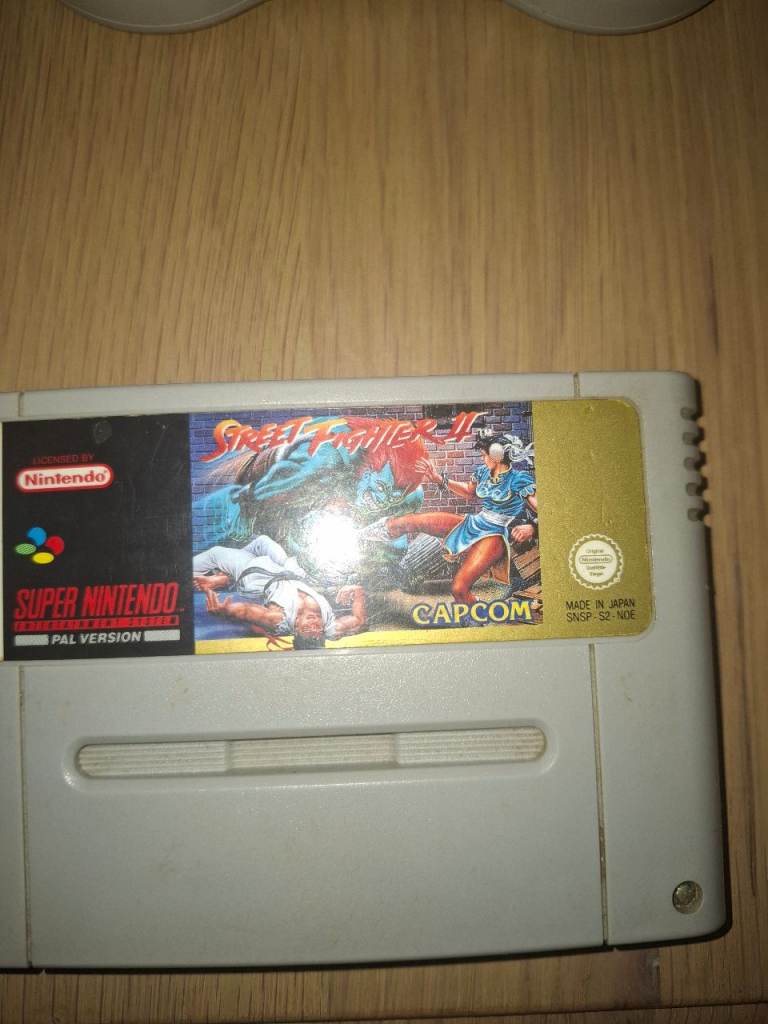 Snes system (original) 
Comes with three games 
One controller 
Street fighter 2 turbo
Super mario a