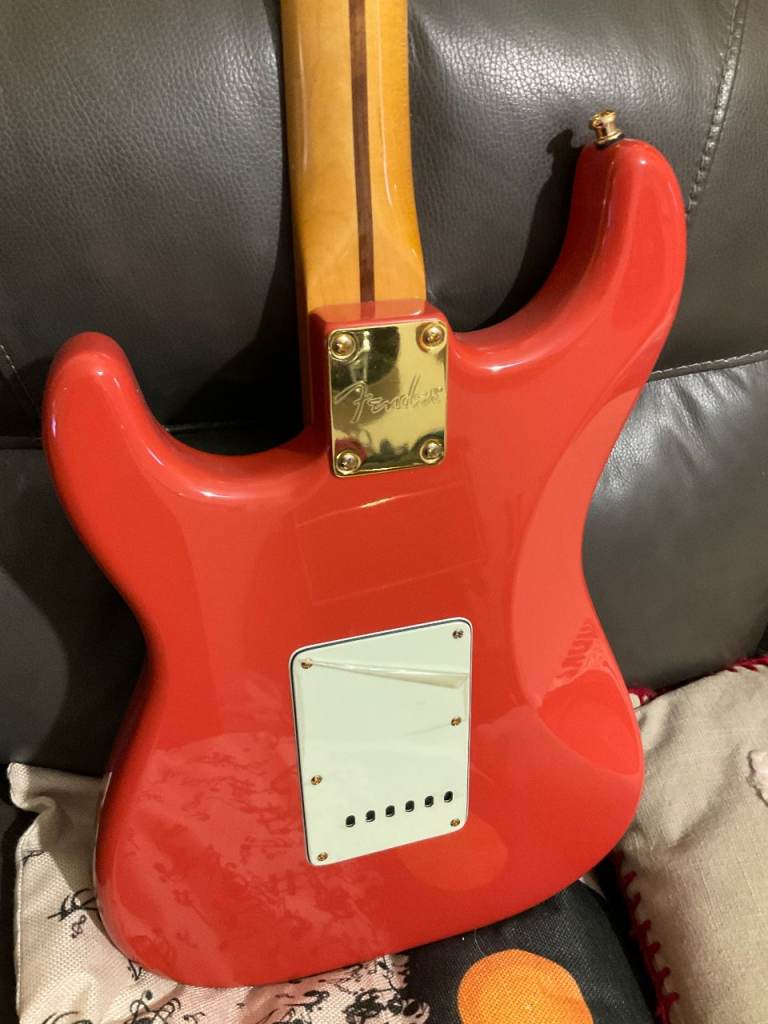 Fender Stratocaster with upgraded Fender gold hardware   