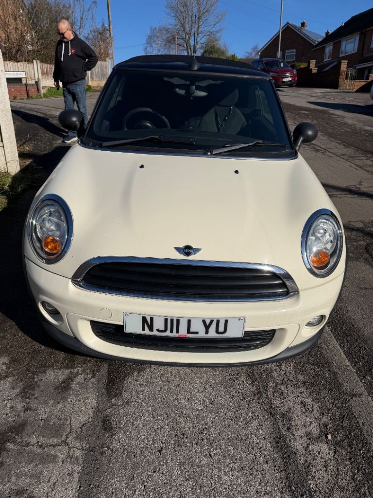 Mini Cooper convertible. 