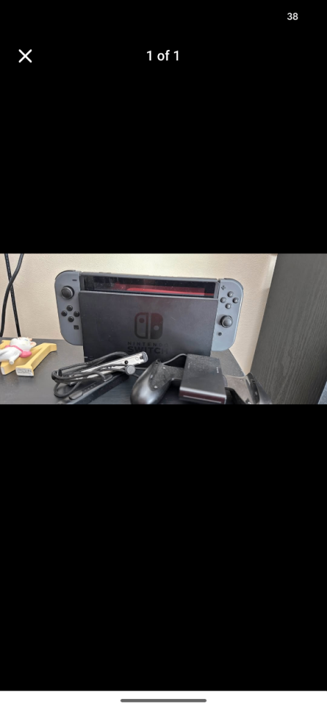 Nintendo Switch Console with Dock and Joy-Cons – Good Condition