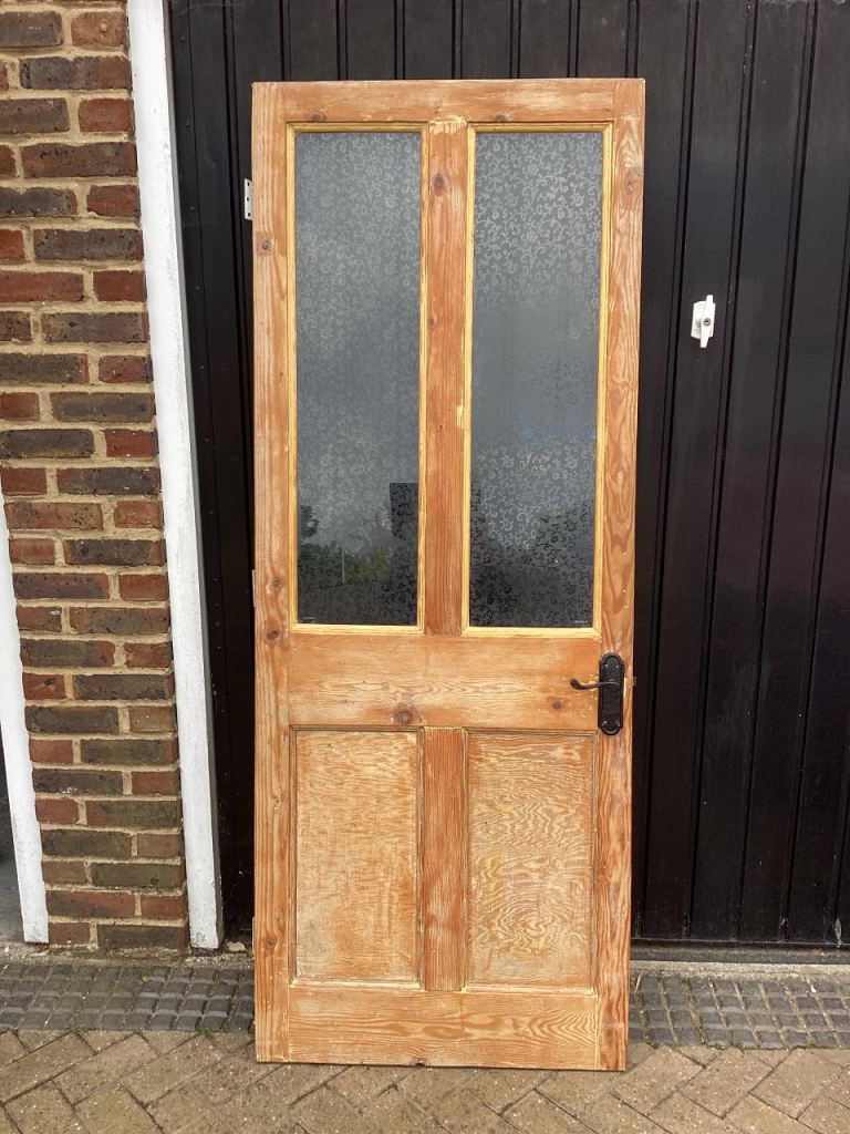 Wooden partial glazed door