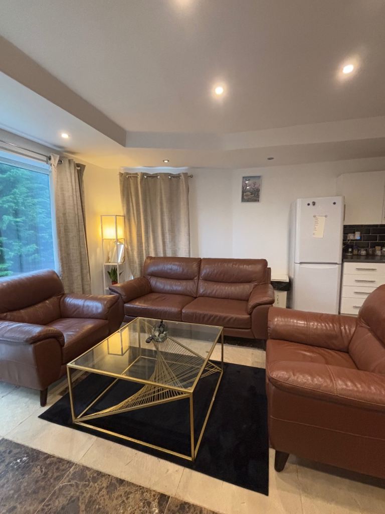 Comfortable Brown Leather Sofa – Good Condition