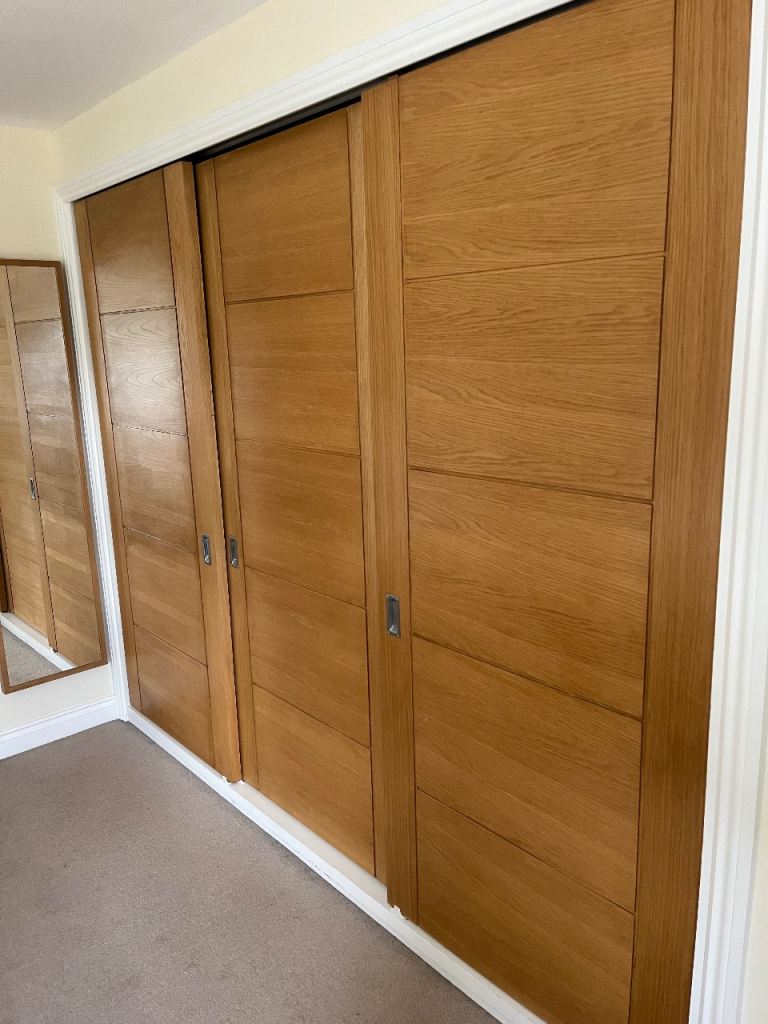 3 Solid Oak Wardrobe Doors With Tracks. 84 wide 198 high