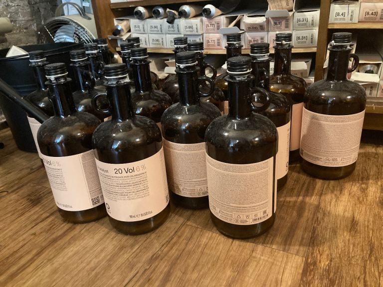 18 brown glass bottles 
