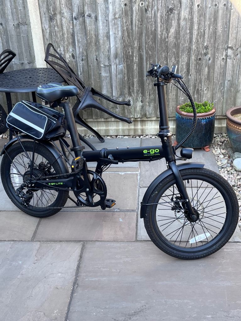 Folding electric assist bikes and tow bar bike rack