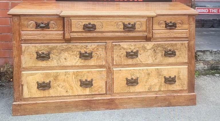 Vintage Spanish Style Oak Serpentine Fronted Sideboard With Seven Drawers, Decorated With Bur Walnut