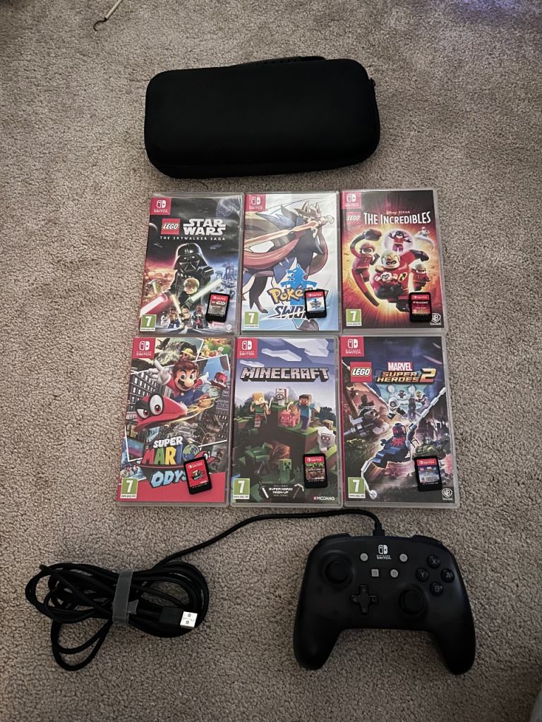 image for Nintendo Switch Games, 1 extra controller and carry case