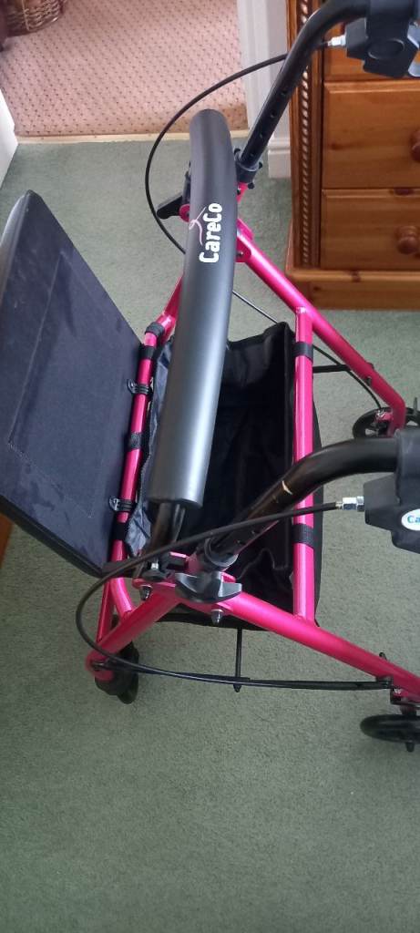 Rollator walker in pink 
