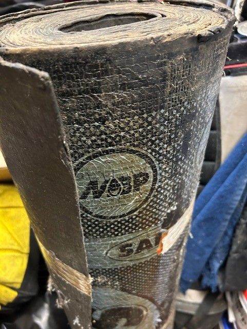 Unused roll of torch on felt