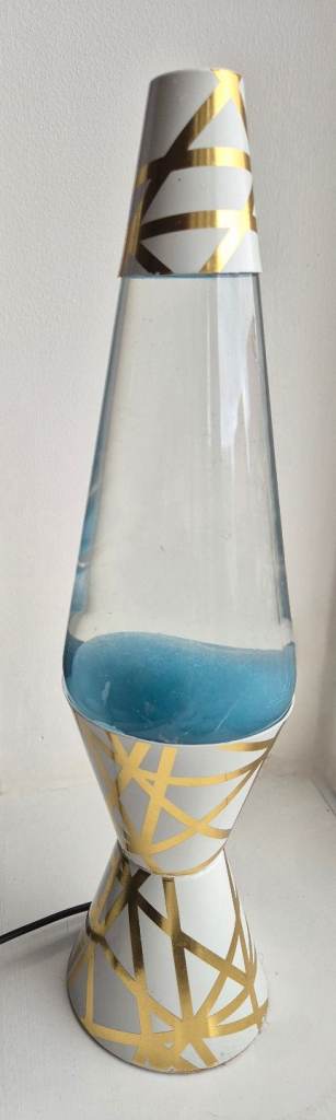 White and gold lava lamp