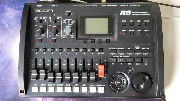 Zoom R8 audio interface, multi effect, multi track recorder.