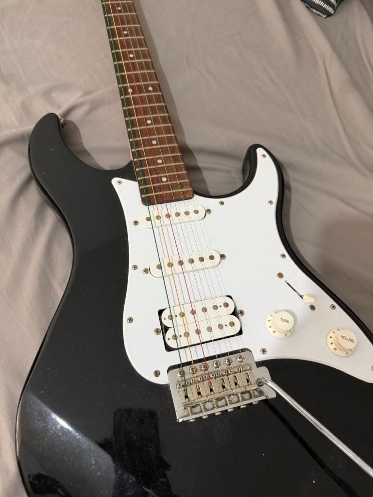 Yamaha Pacifica Electric Guitar with Squier 15 Amp