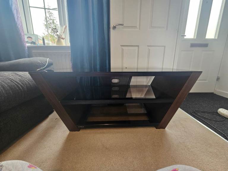 Modern Black Glass TV Stand with Wooden Sides – Good Condition