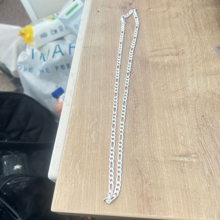 Pretty brand new 925 silver hallmark Figaro chain. 22 inches 