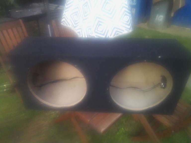 Subwoofer enclosure and one base speaker 