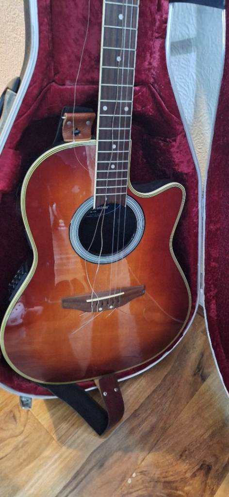 Electric/acoustic guitar, model AE138. Approx 20 years old. with hard case