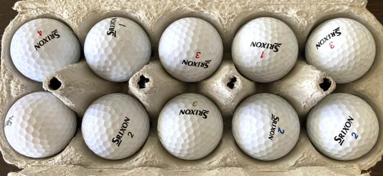 10 White Srixon Golf Balls - Used but Good and Clean