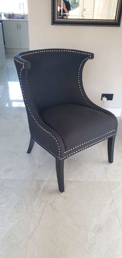 Statement black studded Eichholtz Elson Chair – black fabric (2 available)