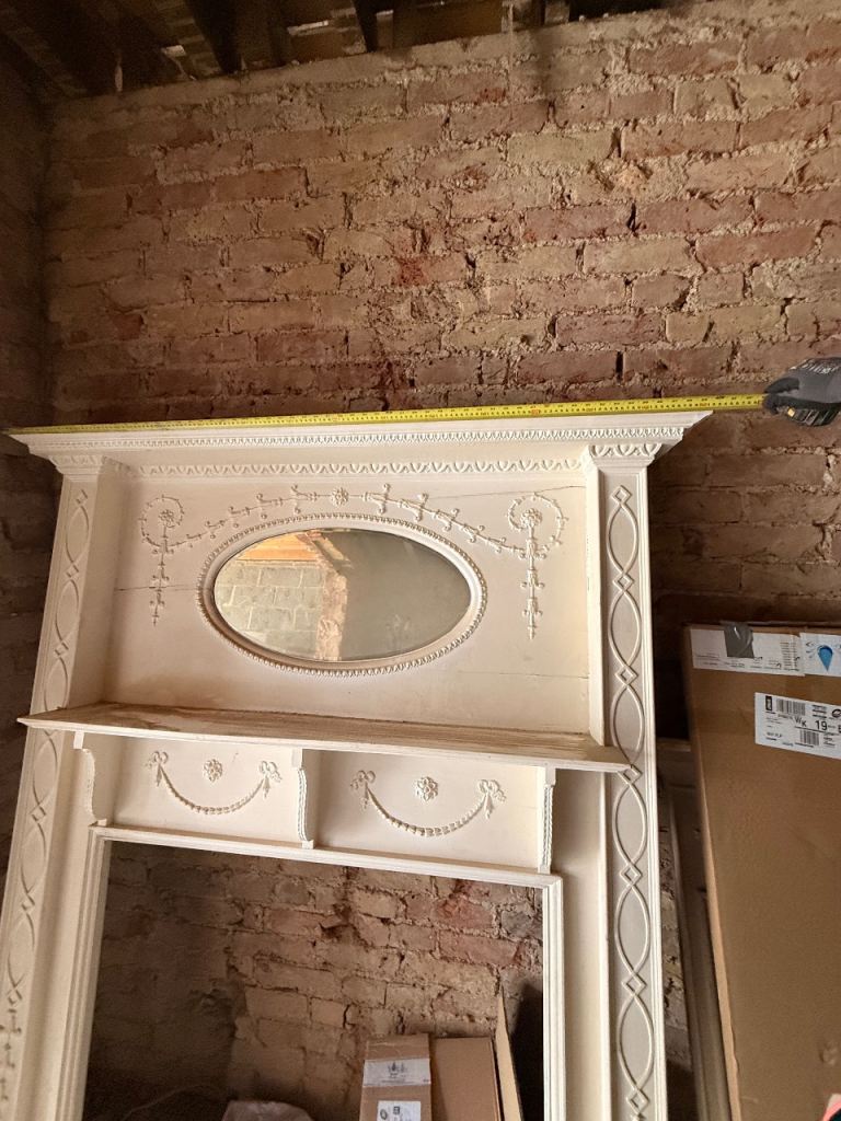 A stunning wooden fireplace surround