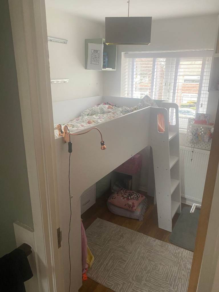 The mid sleeper features a single bed sleeping space with movable under bed furniture.