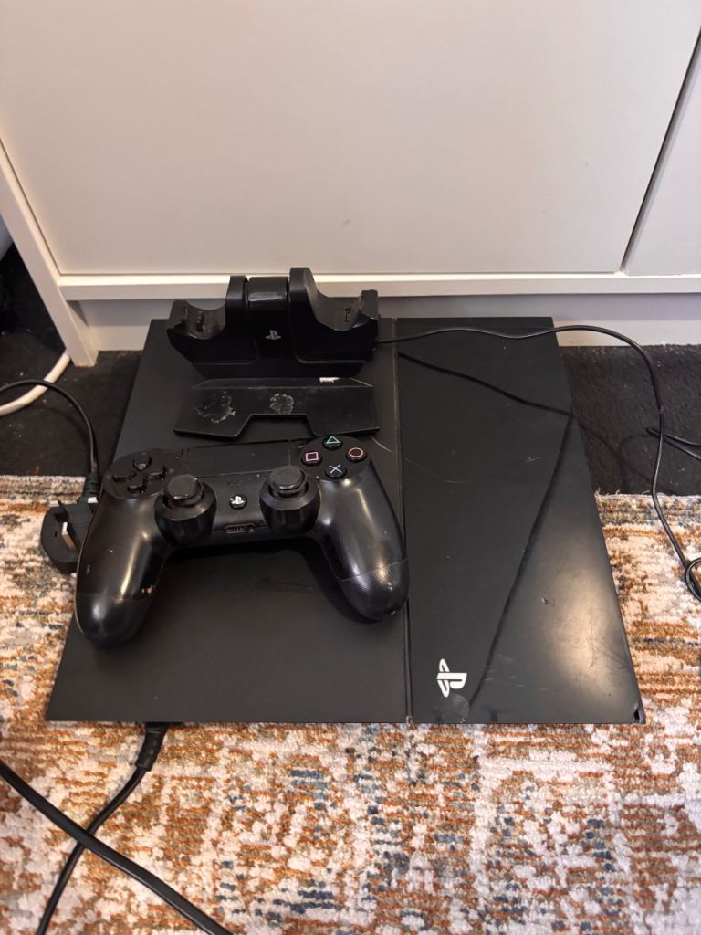 PS4 with controller and charging port 