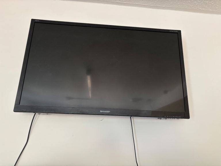 Sharp Black Flat Screen TV with Remote – Good Condition
