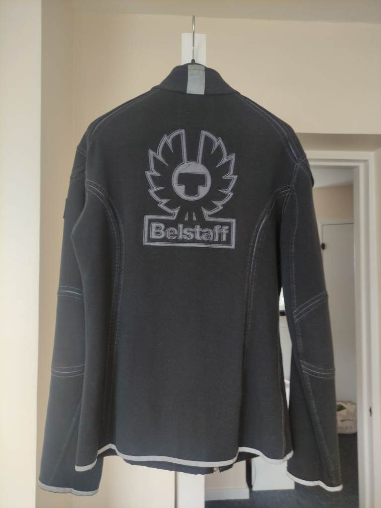  A male Belstaff zipped top, logo on back, fluorescent trims, good condition, size 46/ S