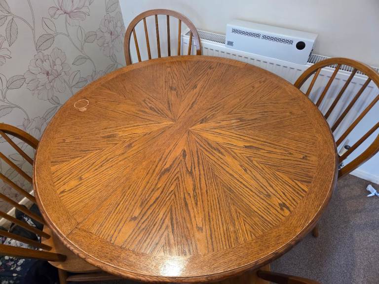 Solid Wood Round Dining Table with Starburst Grain Detail