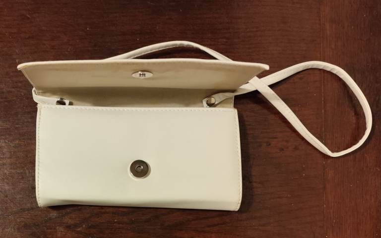 A fashionable and elegant women's leather handbag - a crossbody clutch for special occasions