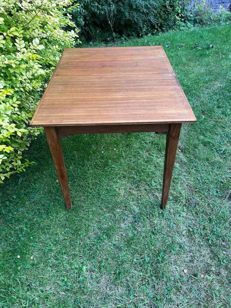 Gordon Russell Extending Dining Table in a light wood, teak, oak or walnut.