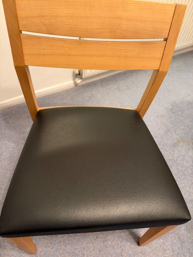 Marks and Spencer’s glass dining table and chairs, £250.00 for Sale