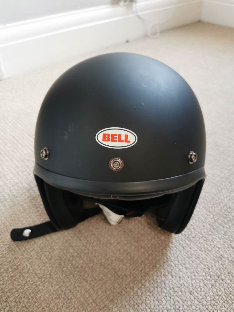 Open face matt black helmet. Size Large