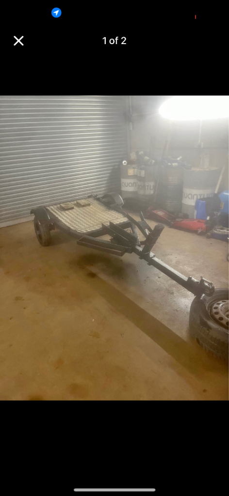 Small Metal Trailer with Spare Wheel – Good for Hauling