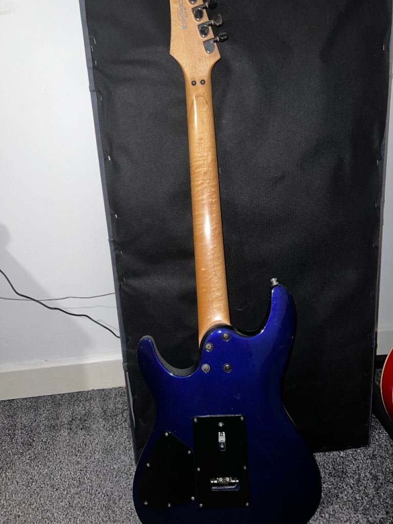 Blue Ibanez s-series electric guitar with hard case