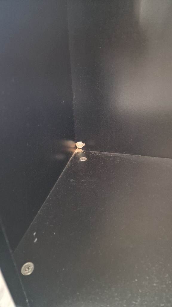 Black unit with glass shelves