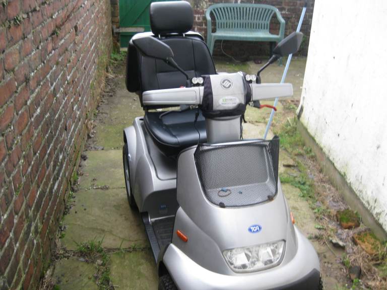 TGA Mobility Scooter – Good Condition, Silver