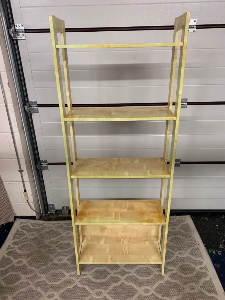 Light wood book case can deliver locally