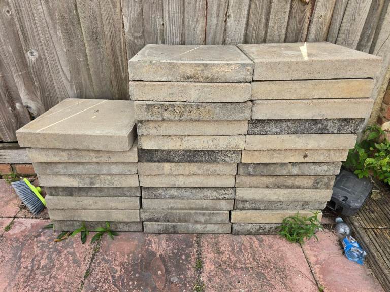 Rectangular cast-concrete paving stones.