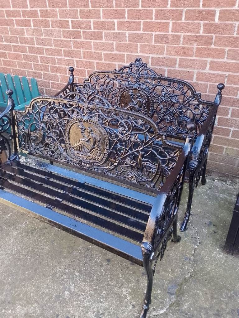 Matching pair of Victorian cast iron garden benches 