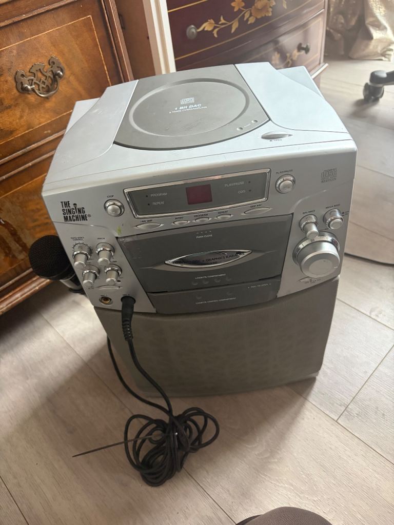 Karaoke Machine with CD Player and Microphone – Good Condition