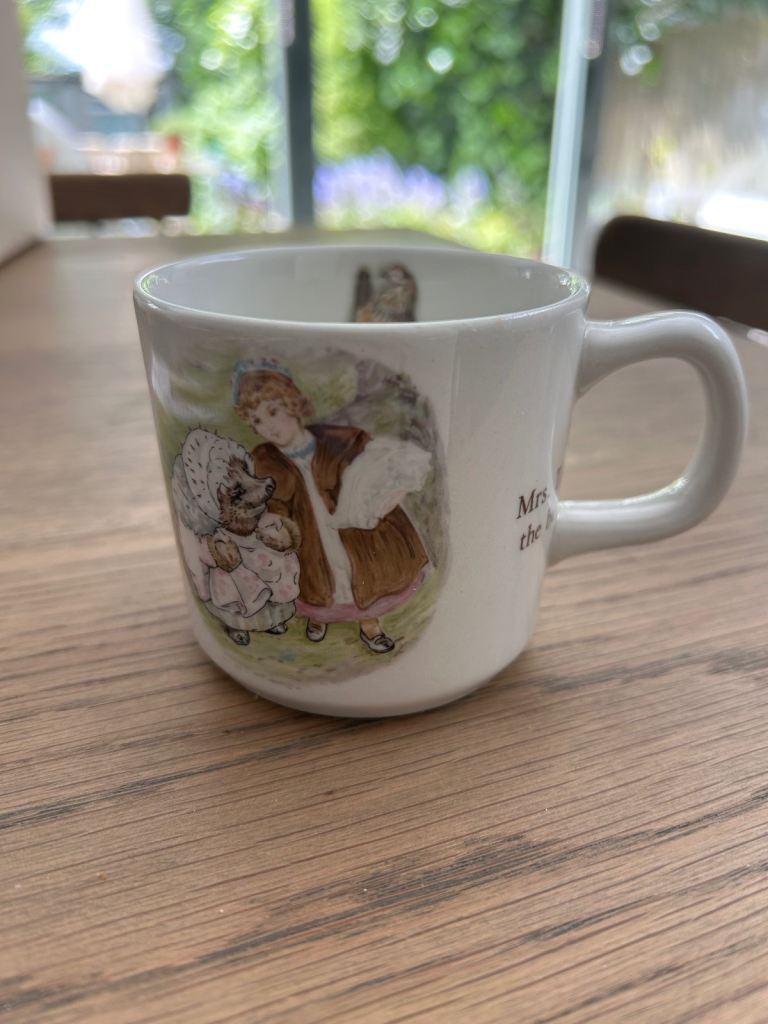 Vintage 80s Beatrix Potter Mrs Tiggywinkle china mug by Wedgwood