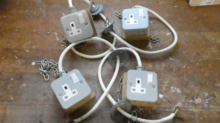 Switched single metal box hanging sockets –used 