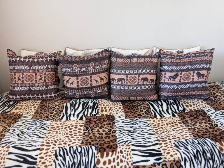 4 x African/safari themed cushions